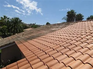 Exterior cleaning project photo showing roof cleaning tile.