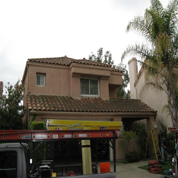 Before roof cleaning photo on a residential tile roof