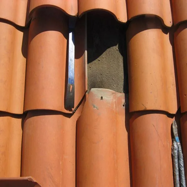 Before and after roof repair tile replacement work