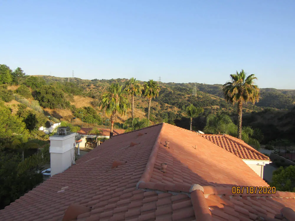 Same terra-cotta tile roof after cleaning