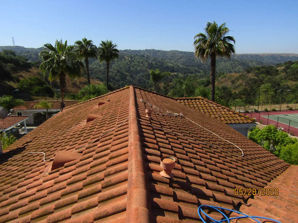 Terra-cotta tile roof before cleaning